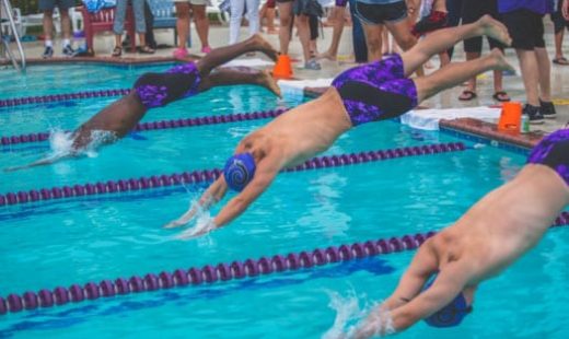 swim race in pool at fitness center near me