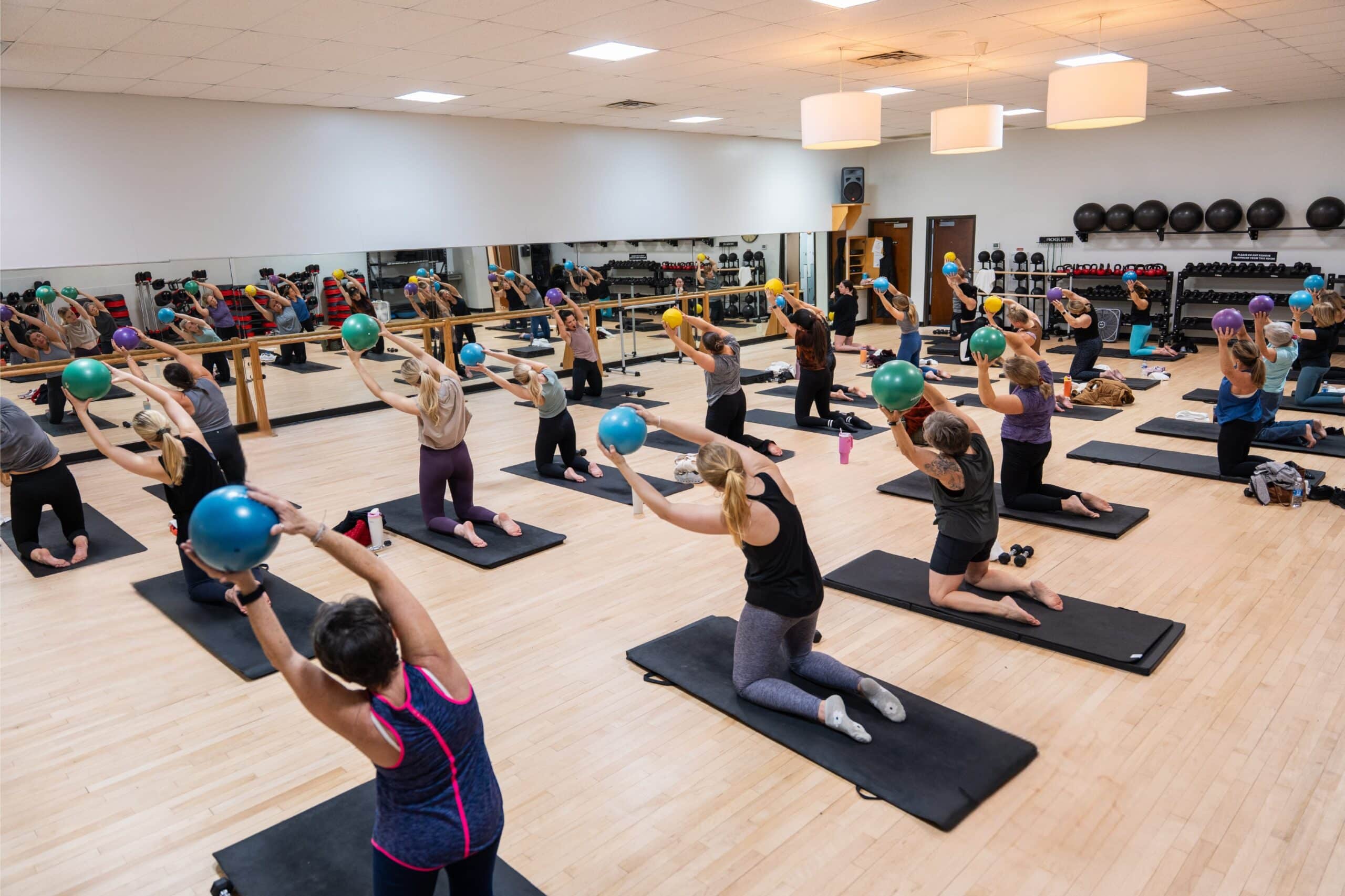 Group exercise class with fitness balls.
