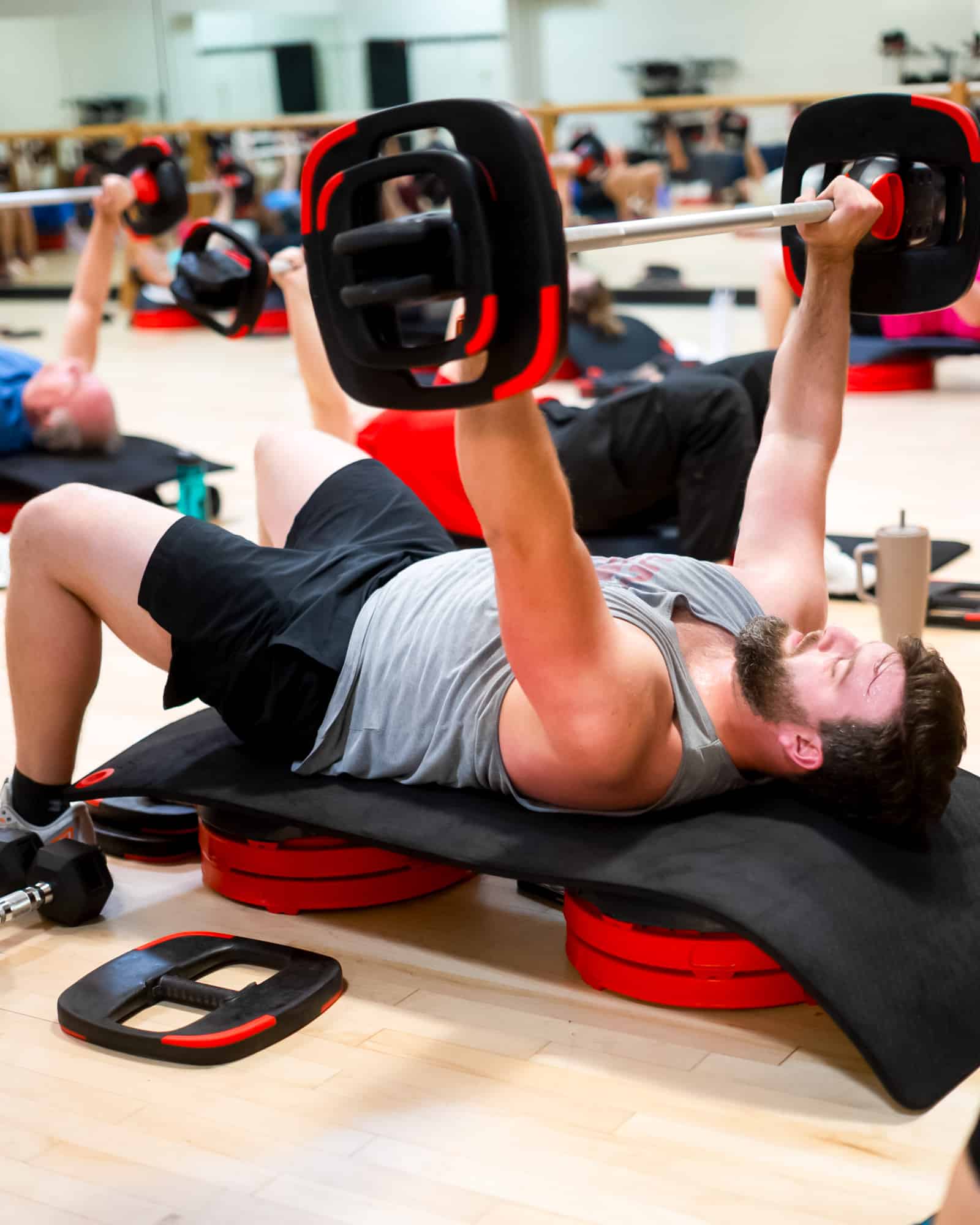 Weightlifting in a fitness class